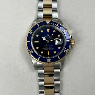 Rolex Submariner 16803 Yellow gold and Stainless steel Blue