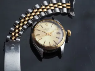 Rolex Date 6916F Yellow gold and Stainless steel Champagne