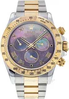 Rolex Daytona 116523/12 40mm Polished steel$18 carat yellow gold White