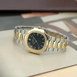 Patek Philippe Nautilus 3900/1 33mm Yellow gold Black