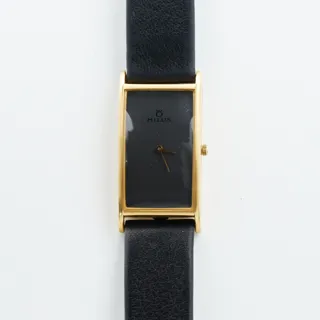 Milus 38mm 18k yellow gold Dark gray