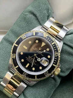 Rolex Submariner 16803-01 Yellow gold and Stainless steel Black