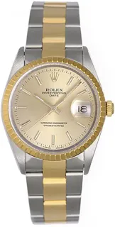 Rolex Oyster Perpetual Date 15223 Stainless steel and 18k yellow gold