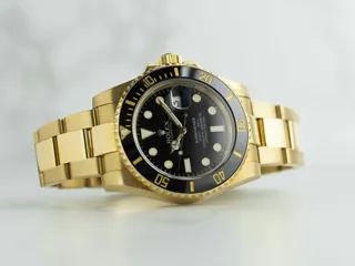 Rolex Submariner 116618LN Yellow gold Black