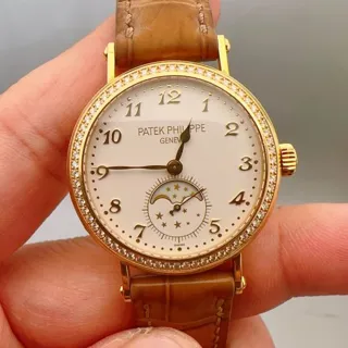 Patek Philippe Moonphase 7121J-001 33mm Yellow gold White