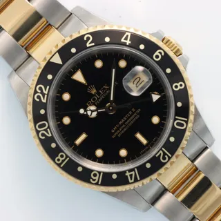 Rolex GMT-Master II 16713 40mm Yellow gold and Stainless steel Black