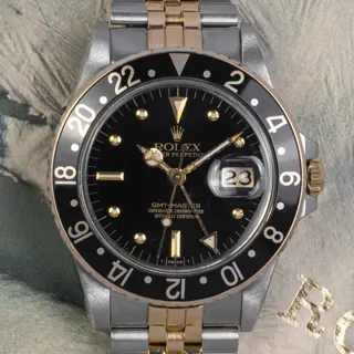 Rolex GMT-Master 16753 40mm steel$18k yellow gold Black