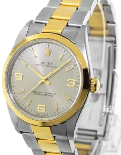 Rolex Oyster Perpetual 14203 Stainless steel and 18k yellow gold Gray