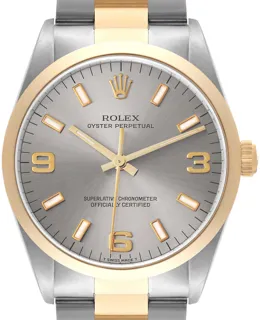 Rolex Oyster Perpetual 14203 Stainless steel and 18k yellow gold Gray