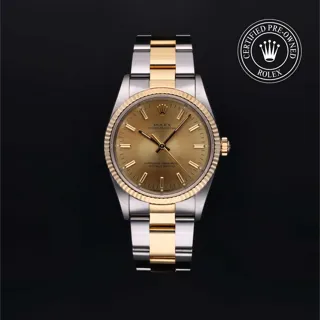 Rolex Oyster Perpetual 14233 34mm Rolesor 18 Carat Yellow Champagne