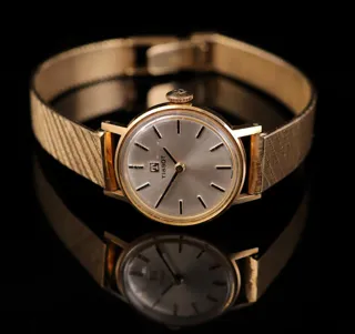 Tissot 14k yellow gold