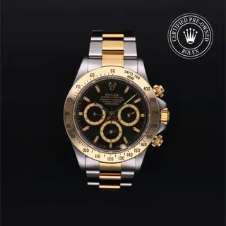 Rolex Cosmograph Daytona 16523 40mm Oystersteel$yellow gold Black