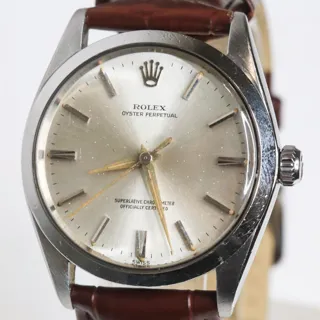 Rolex Oyster Perpetual 1002 34mm Yellow gold Silver