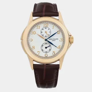 Patek Philippe Travel Time 5134J 37mm Yellow gold White