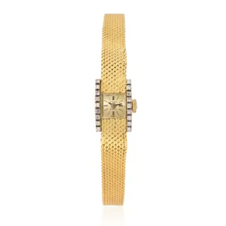 Universal Genève 18k yellow gold Champagne