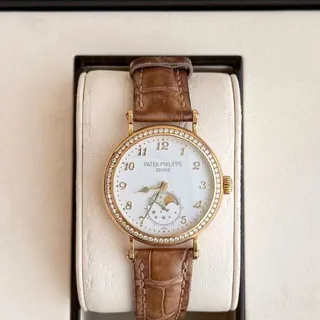 Patek Philippe Moonphase 7121J-001 33mm Yellow gold White