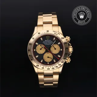 Rolex Daytona 116528 40mm Yellow gold Black