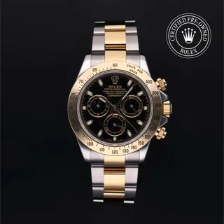 Rolex Daytona 116523 40mm Yellow gold and Stainless steel Black