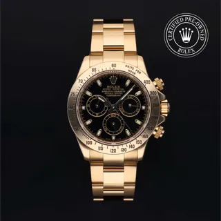 Rolex Daytona 116528 40mm Yellow gold Black