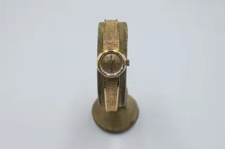 Omega 13mm 18k yellow gold Champagne