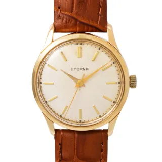 Eterna 33mm 14k yellow gold