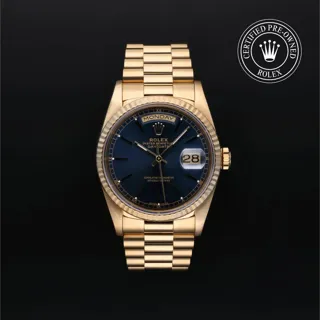 Rolex Oyster Perpetual Day-Date 18238‑0007 36mm 18 Karat Gelbgold Dunkles Zifferblatt (Blau Index)