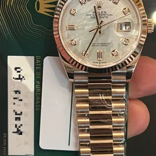 Rolex Day-Date 36 128235-0029 Rose gold White