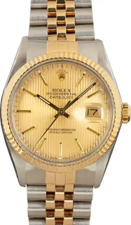 Rolex Datejust 36 16013 Stainless steel and 18k yellow gold Champagne Tapestry