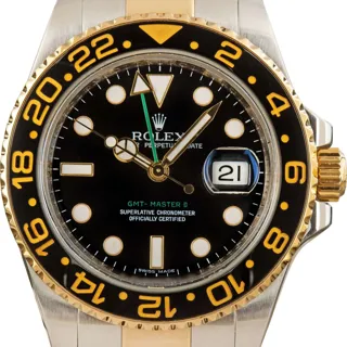 Rolex GMT-Master II 116713 Stainless steel and 18k yellow gold Black