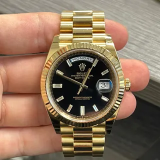 Rolex Day-Date 40 228238-0004 Yellow gold Black