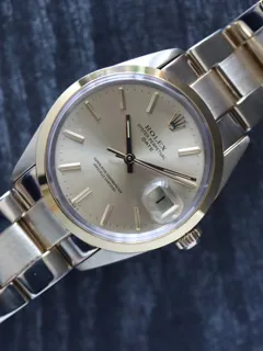 Rolex Oyster Perpetual Date 1550 Stainless steel and Gold-plated champagne