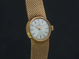 Omega 18k yellow gold Silver