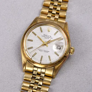 Rolex Oyster Perpetual Date 1503 34mm 14k yellow gold Silver