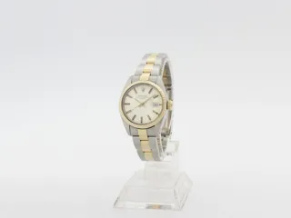 Rolex Oyster Perpetual Date 6917 Stainless steel and 18k yellow gold Champagne