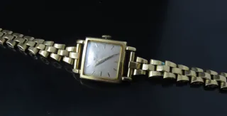 Omega 18k yellow gold White