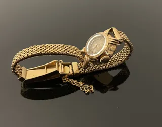 Omega 18k yellow gold