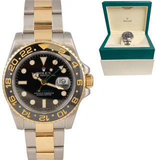 Rolex GMT-Master II 116713 Stainless steel and 18k yellow gold Black