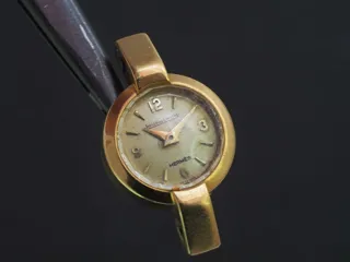 Hermès 16mm 18k yellow gold Cream