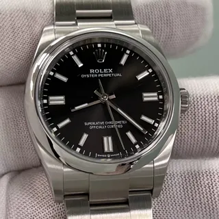 Rolex Oyster Perpetual 126000-0002 Stainless steel Black