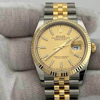 Rolex Datejust 126233-0015 Yellow gold and Stainless steel Champagne